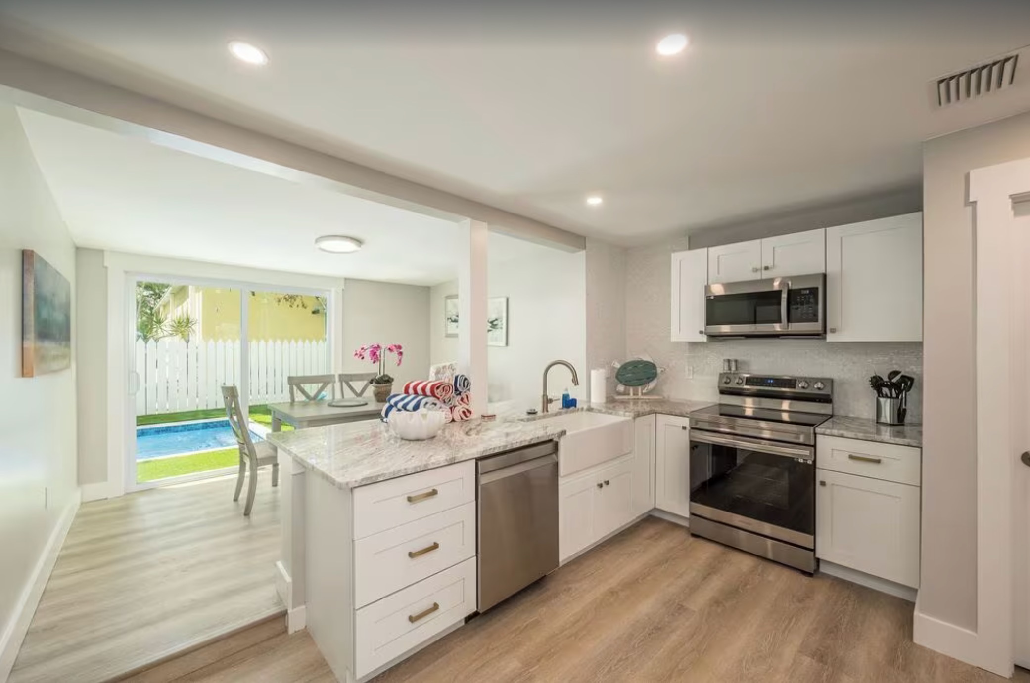 White Kitchen with Pool View